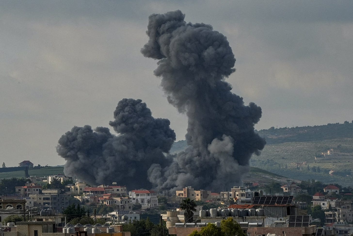 Smoke rises in Habboush following Israeli strikes, as seen from Nabatieh