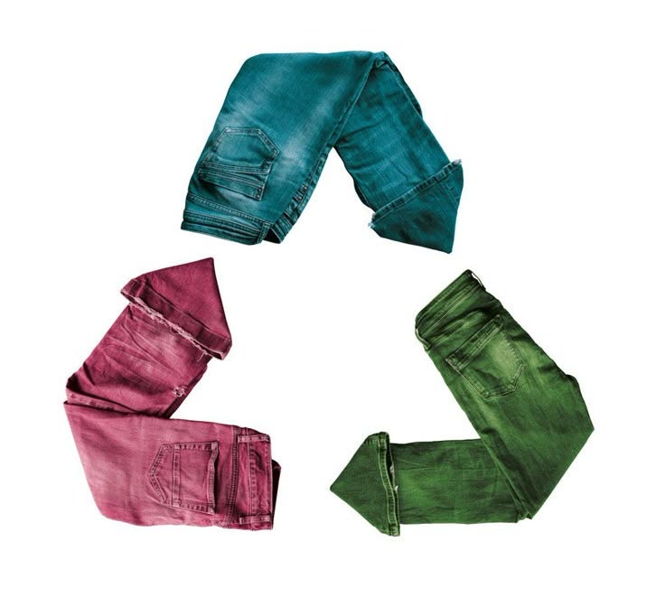 This may contain: four different colored jeans arranged in a circle