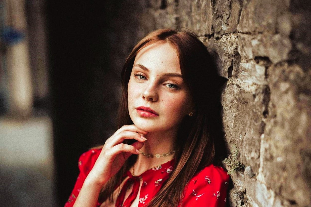 Young woman looking emotional Young woman looking emotional