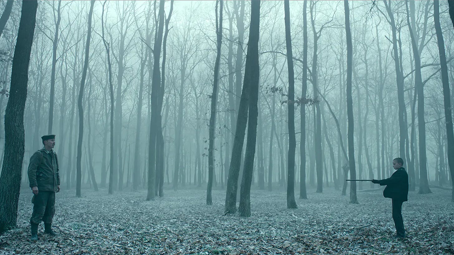 A harrowing scene in a film full of them: a child pointing a gun at a soldier in a wintry forest