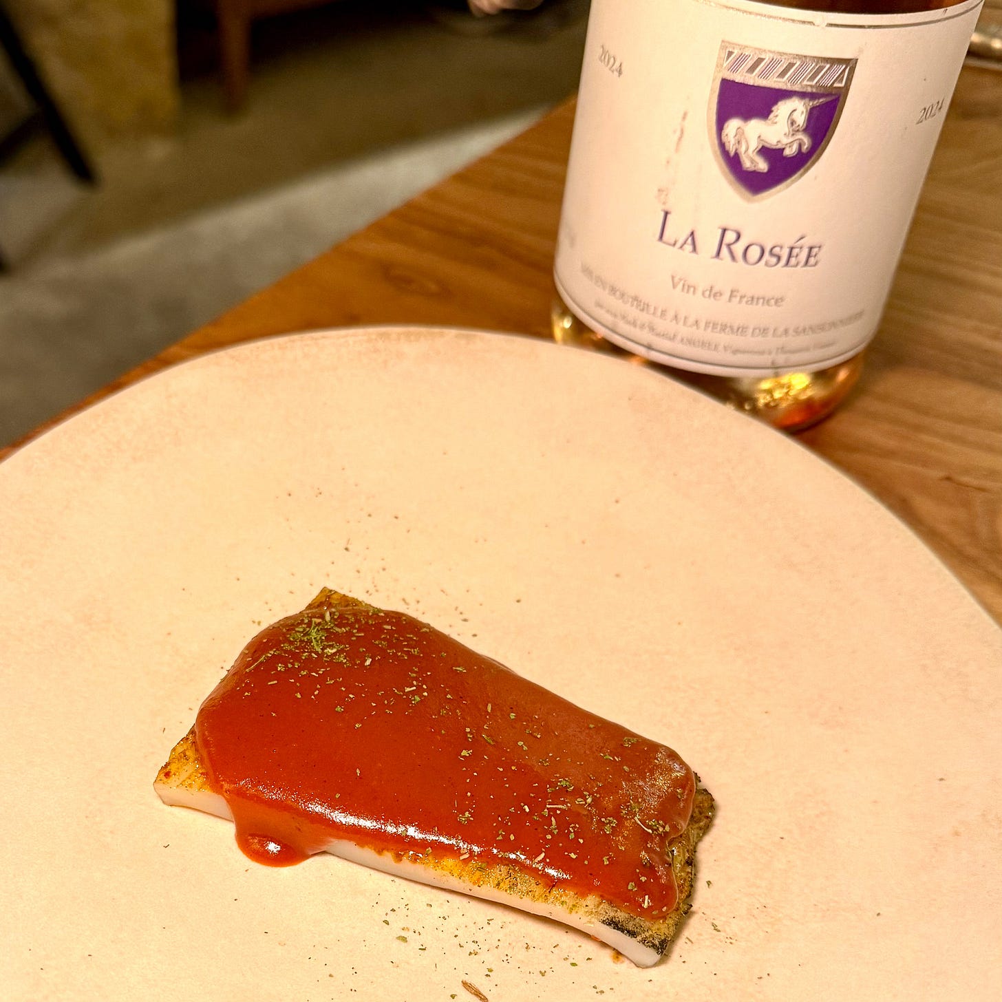 Squid with bloody mary sauce and La Rosée rosé at Masaikuta, Paris 11th