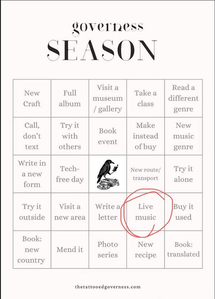 Image of a bingo game and photo taken at Cure concert