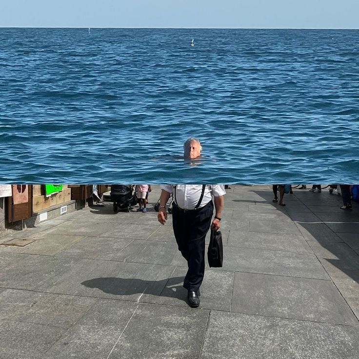 This may contain: the man is walking along the pier by the water