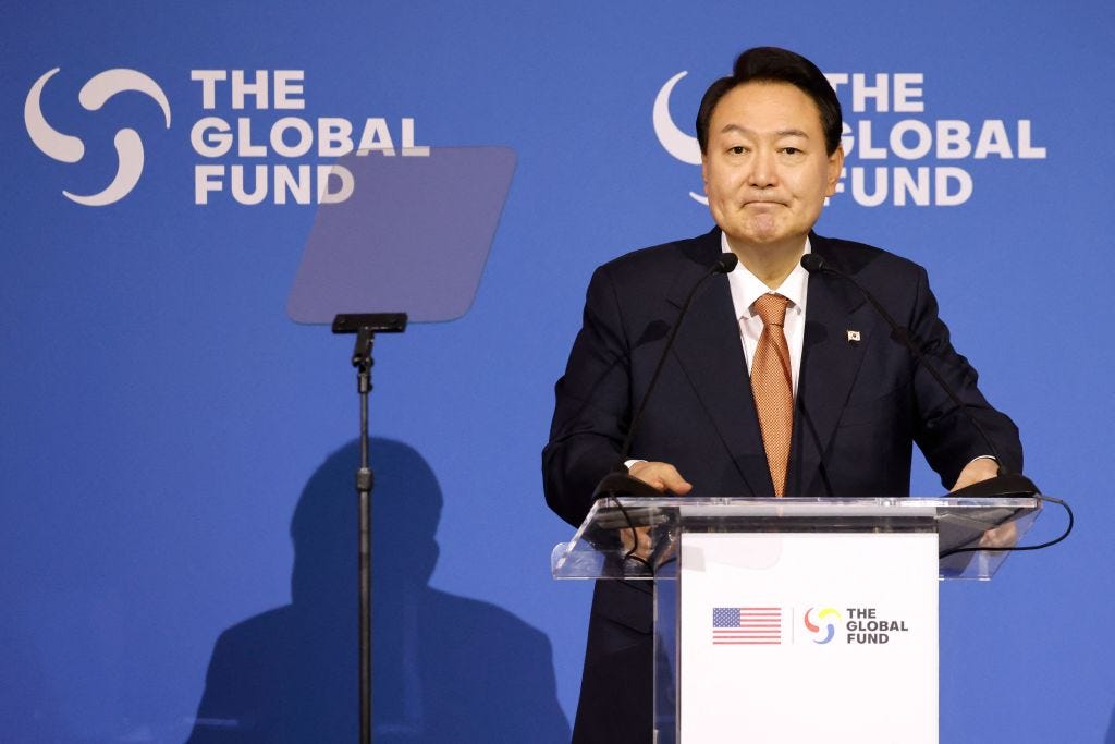 Yoon during the Global Fund conference, presumably around the time he goofed up (LUDOVIC MARIN/AFP via Getty Images)