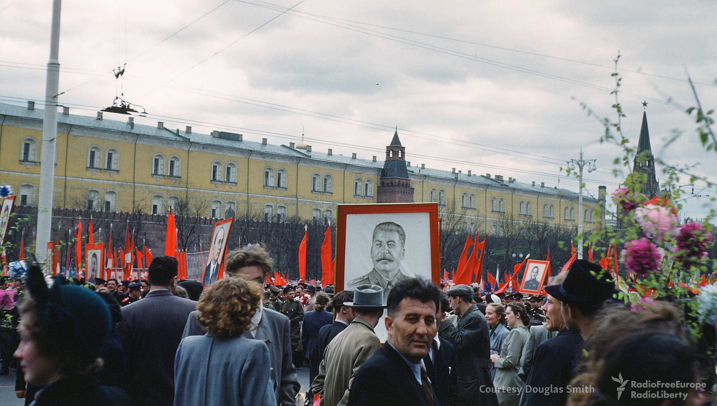Another vibrant parade scene on Manezhnaya ploshchad, Moscow, showcasing public gatherings in the 1950s. Another vibrant parade scene on Manezhnaya ploshchad, Moscow, showcasing public gatherings in the 1950s.