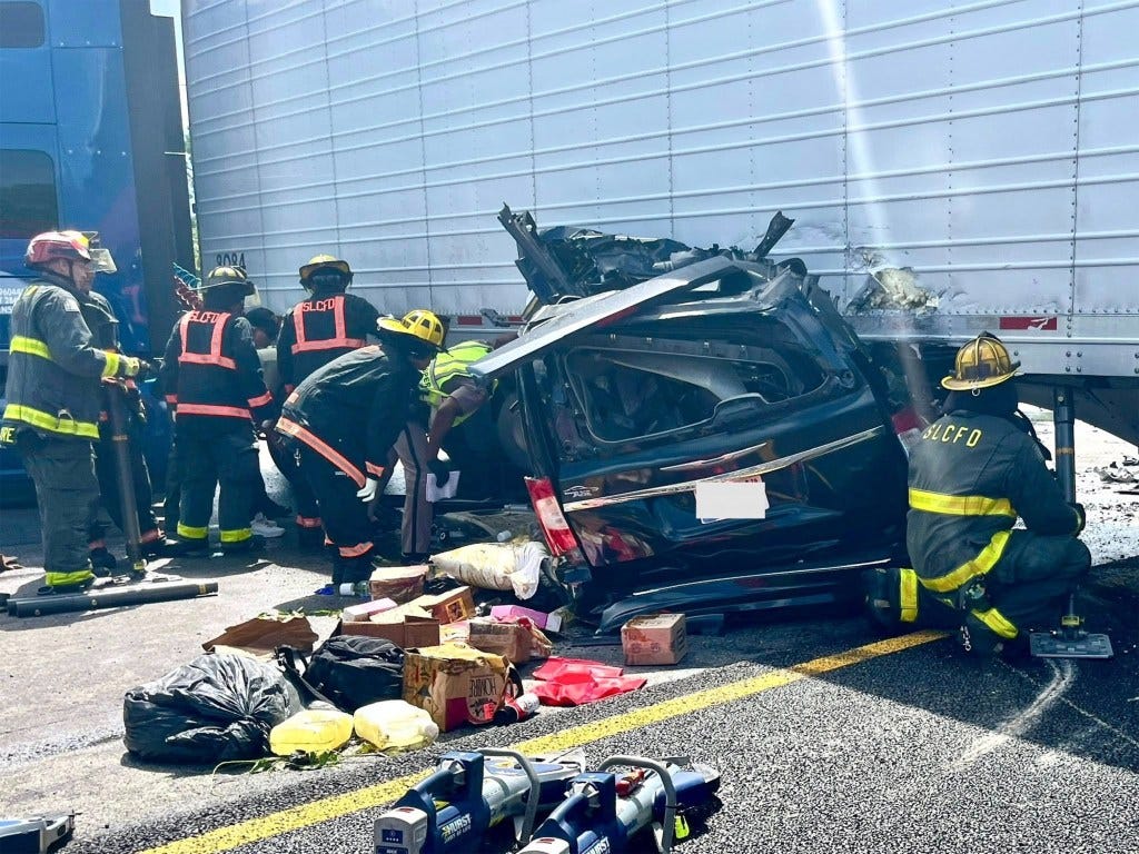 Emergency responders at a fatal car crash.