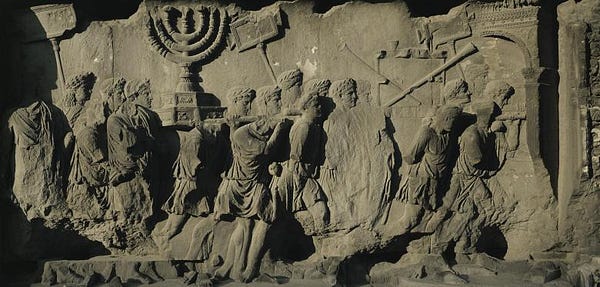 Wall Relief on the Arch of Titus. Source: https://www.welt.de/geschichte/gallery142488494/Der-Triumph-des-spaeteren-Kaisers-Titus-39-81.html