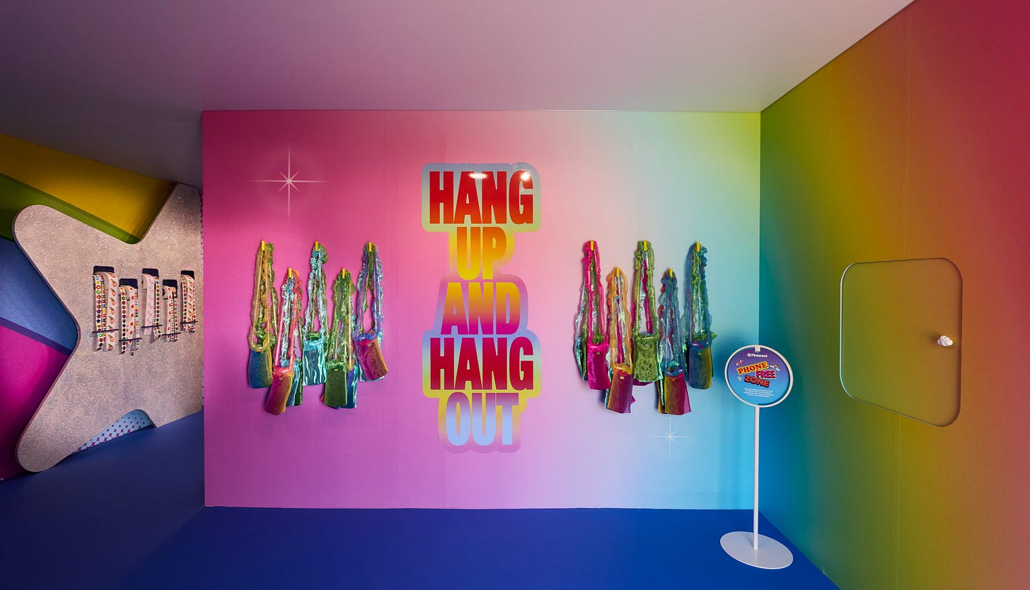 Pinterest activation at Coachella, a rainbow colored interior with a wall reading Hang Up and Hang Out Pinterest activation at Coachella, a rainbow colored interior with a wall reading Hang Up and Hang Out