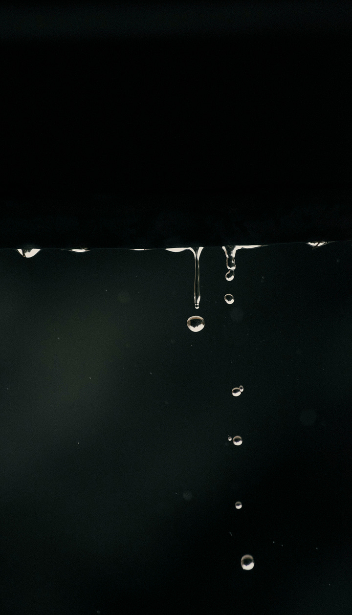Raindrops. Photo by Gaspar Zaldo via Unsplash. Walls colored with crayon and chalk..