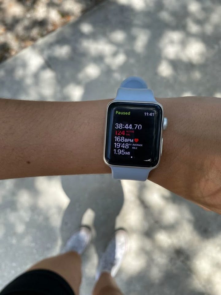 running outdoors in comfortable athletic gear during a sunny morning jog.