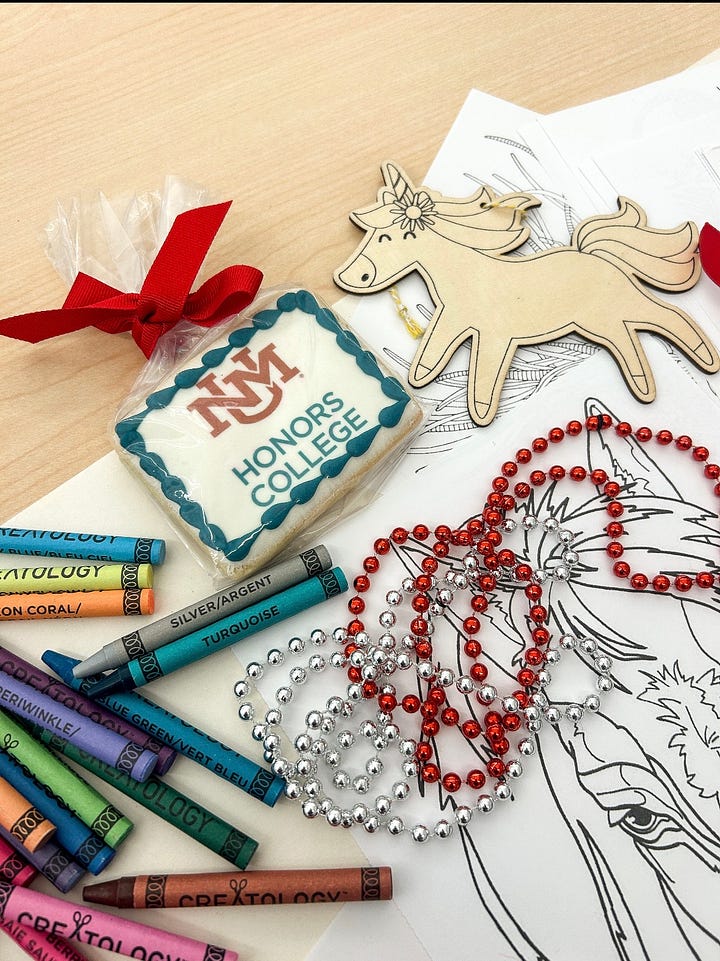 Pizzas on a table with students serving themselves; A UNM honors college cookie next to red and silver beads and crayons
