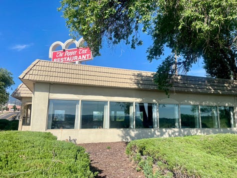 My photos of the restaurant sign and the hills.