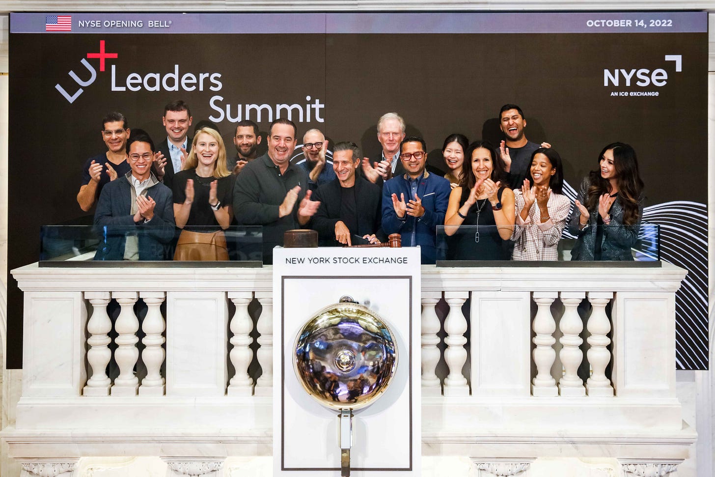 The Lux team successfully hit a button and rang the bell at the New York Stock Exchange to usher in the start of the Lux Leaders Summit. Markets jumped — and then dropped as we walked away from the podium… / Credit: NYSE The Lux team successfully hit a button and rang the bell at the New York Stock Exchange to usher in the start of the Lux Leaders Summit. Markets jumped — and then dropped as we walked away from the podium… / Credit: NYSE
