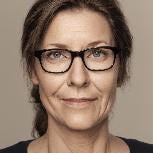 A person wearing glasses and a black shirt

Description automatically generated
