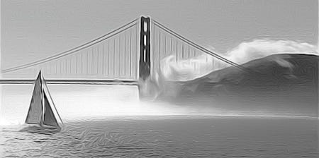 Fog sweeping in past the headlands and toward a sailboat in the San Francisco Bay