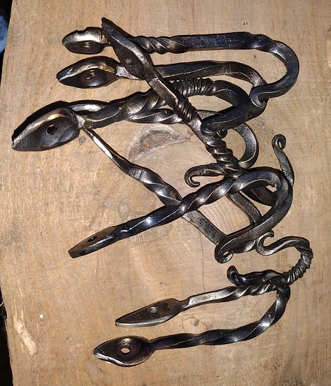 Photos of the project progressing from rebar to final hooks.
