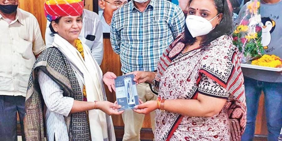 Asha Kandara being felicitated by Kunti Dewra, Mayor and CEO of the Jodhpur Municipal Corporation, where she worked as a cleaner till recently. Asha Kandara being felicitated by Kunti Dewra, Mayor and CEO of the Jodhpur Municipal Corporation, where she worked as a cleaner till recently.
