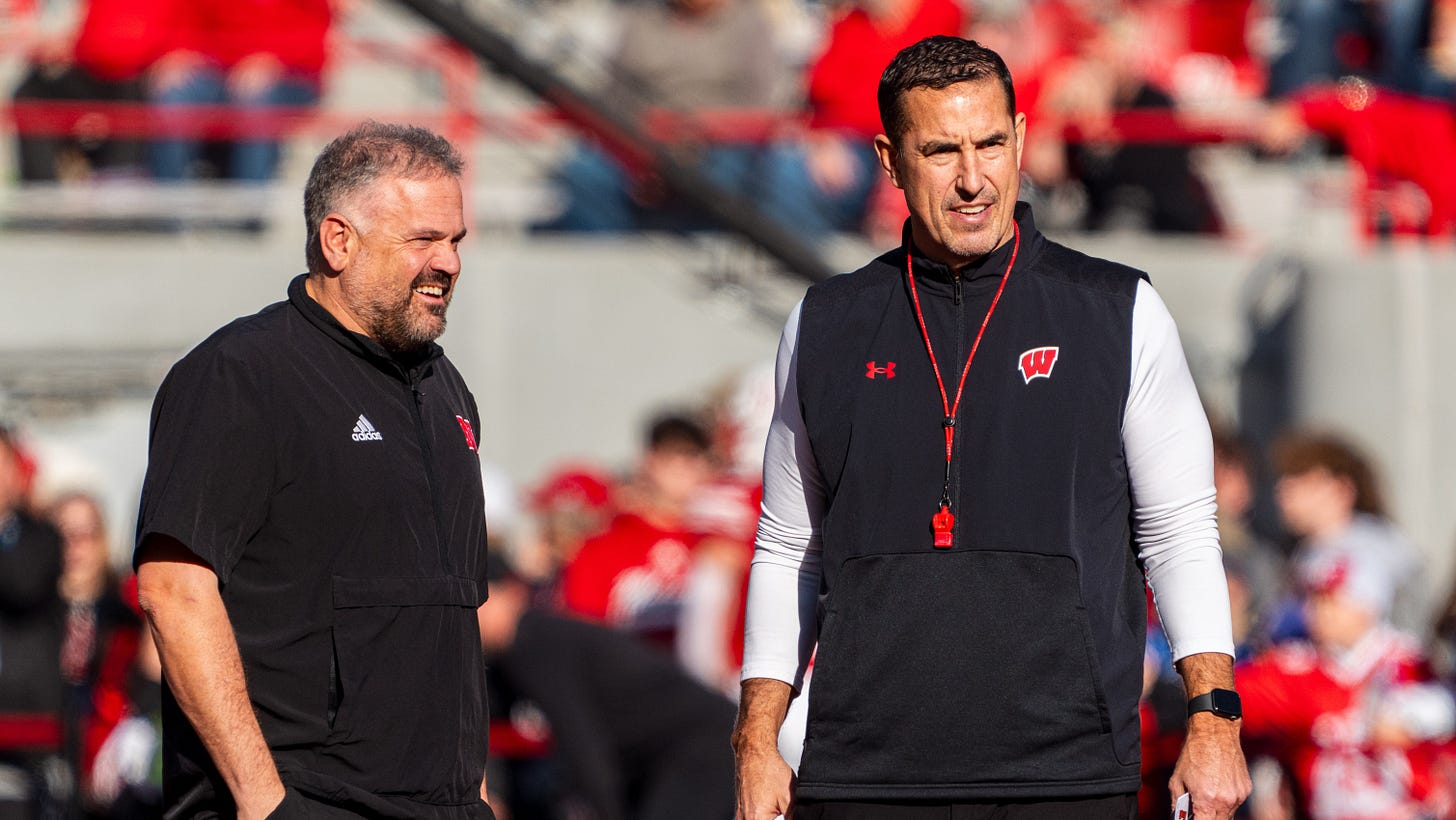 Nebraska Cornhuskers head coach Matt Rhule and Wisconsin Badgers head coach Luke Fickell talk before a game at Memorial Stadium. Nebraska Cornhuskers head coach Matt Rhule and Wisconsin Badgers head coach Luke Fickell talk before a game at Memorial Stadium.