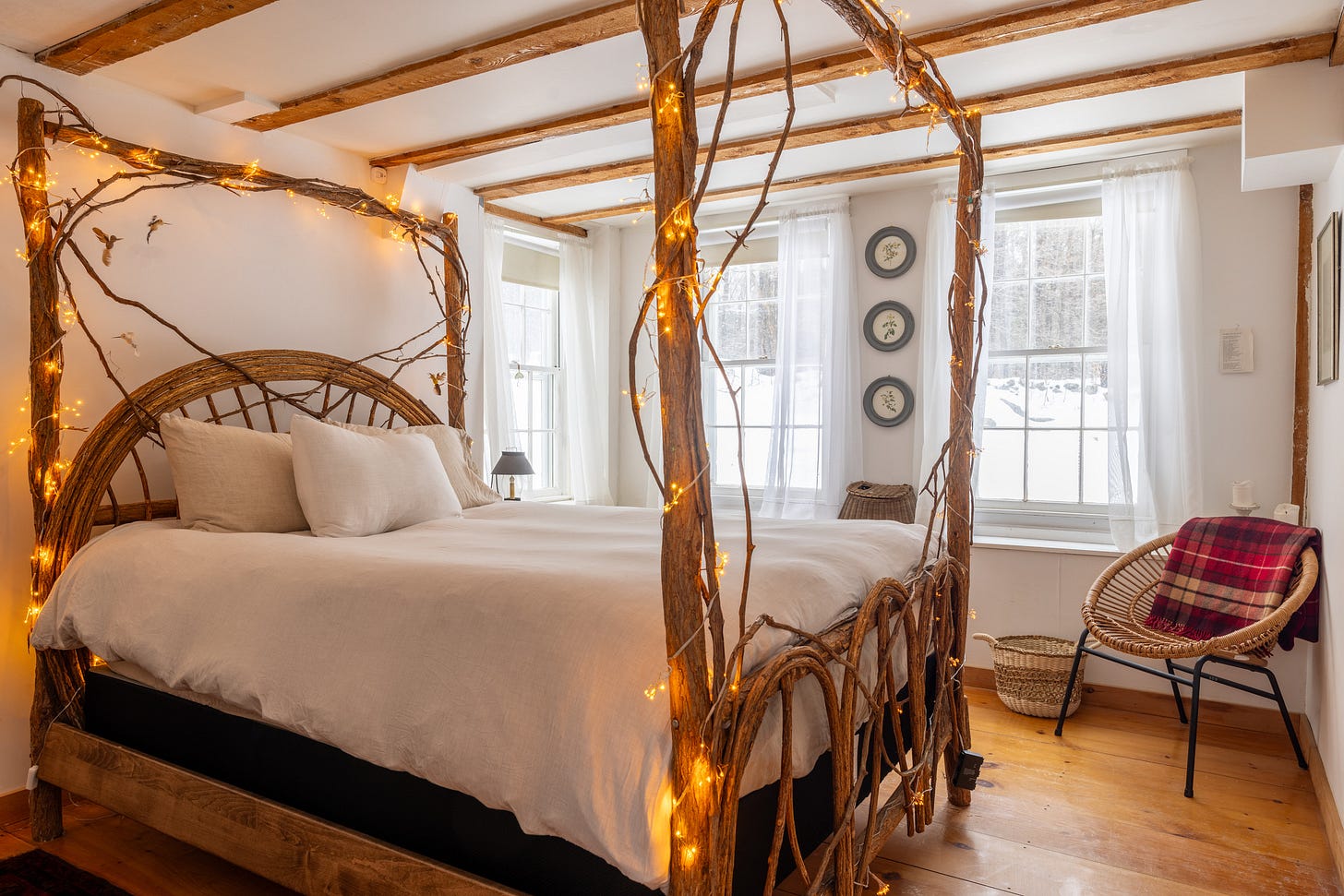 a bedroom with a woodland esk bedframe with white bedding and casual decor a bedroom with a woodland esk bedframe with white bedding and casual decor