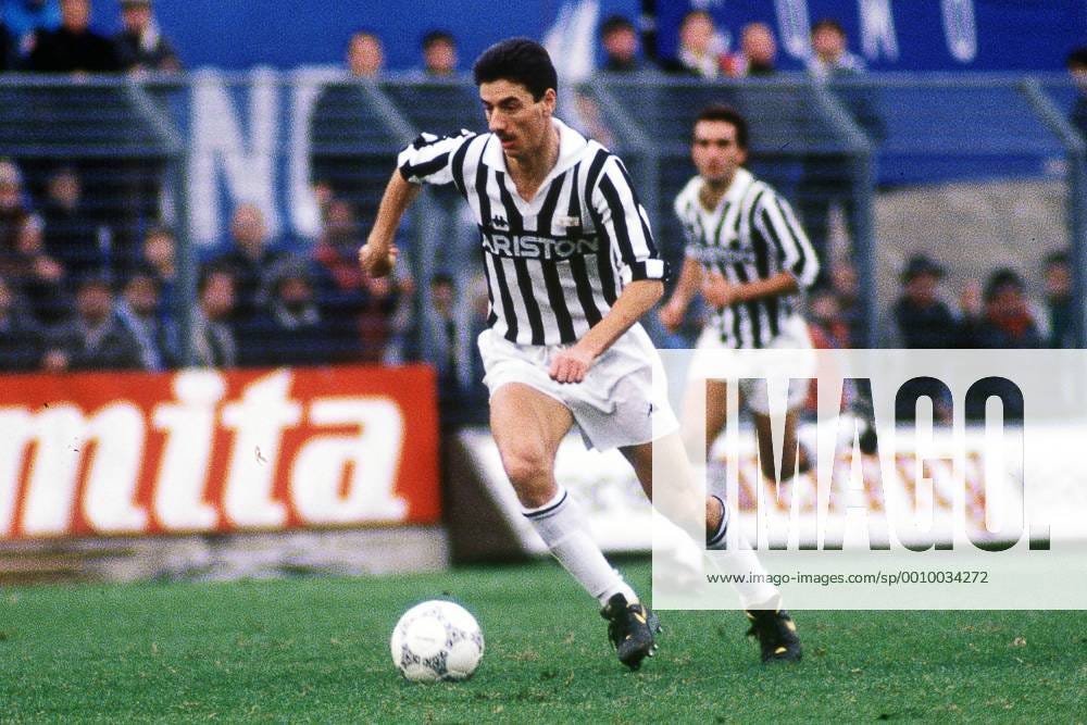 Ian Rush in a Juventus kit, in possession of the ball and driving towards goal Ian Rush in a Juventus kit, in possession of the ball and driving towards goal