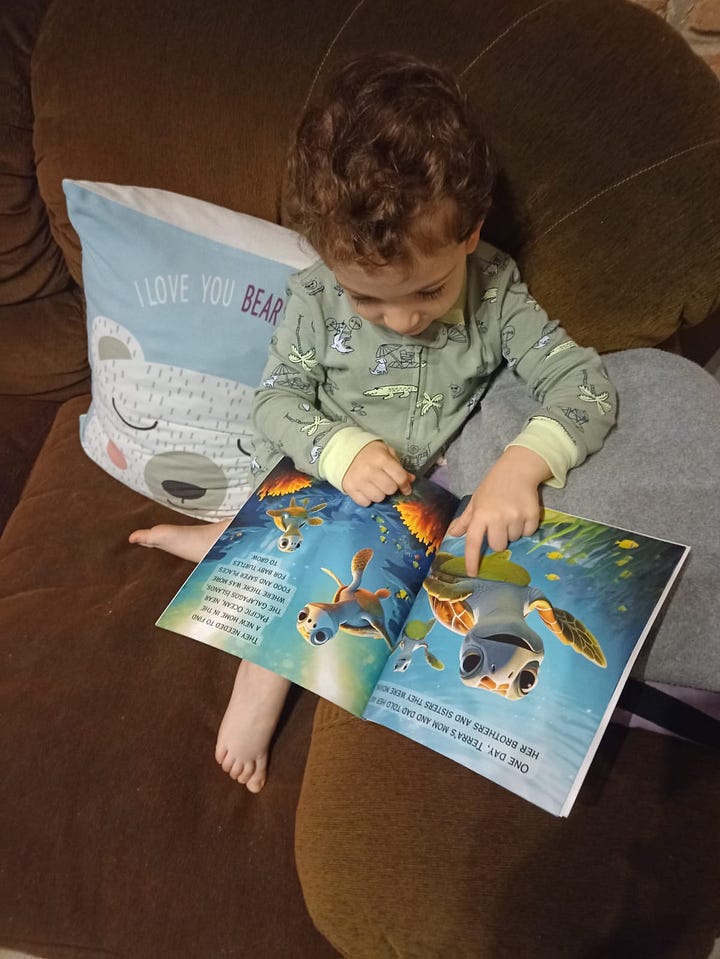 two kids reading our books