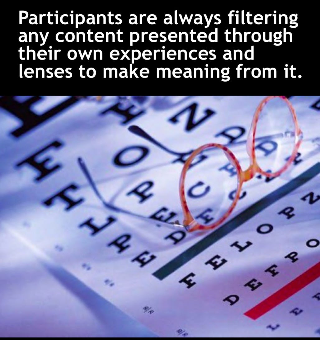 close-up of an eye exam chart with a pair of eyeglasses sitting atop it