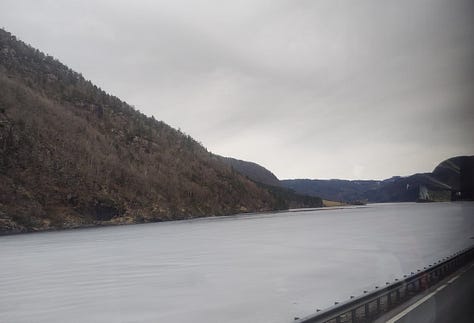 Rocks hills and a frozen lake