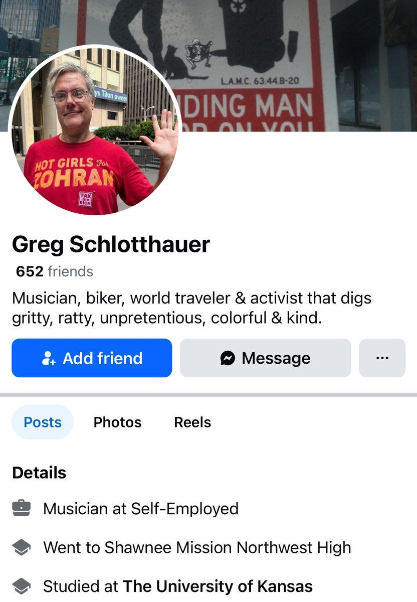 Greg Schlotthauer wearing a red T-shirt with "HOT GIRLS" text in yellow and white, waving his hand. A circular profile image of him is overlaid on a background showing a street scene with a sign reading "LAMC 53449 20 ENDING ON YOU" in black and white. Text below the image includes "Greg Schlotthauer" and details like "652 friends" and his roles as a musician, biker, world traveler, and activist.