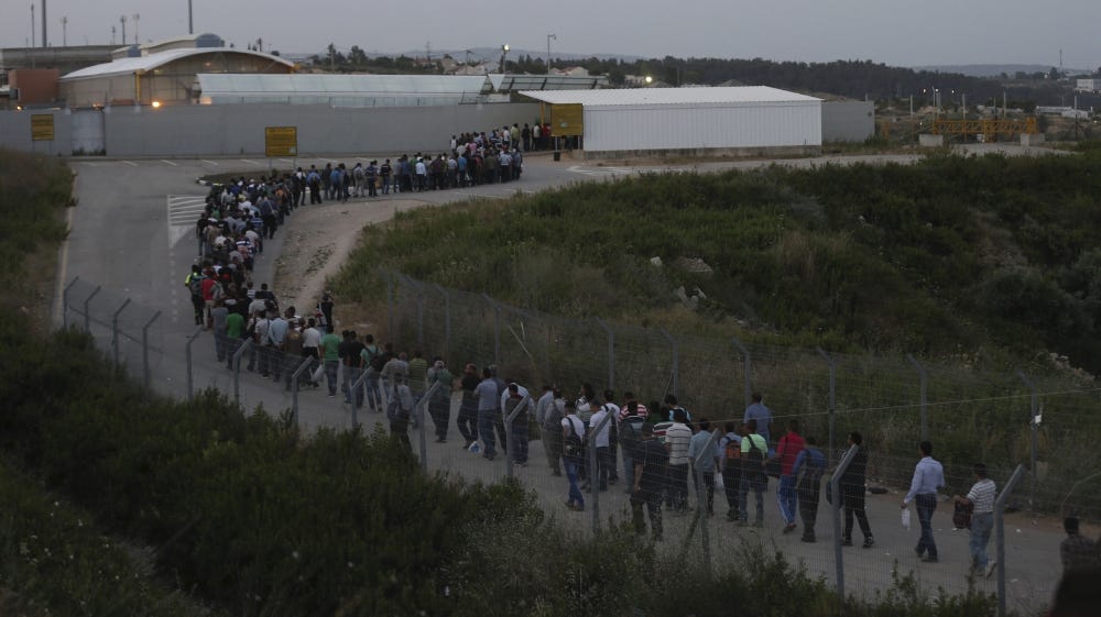  There are hundreds of checkpoints, roadblocks and flying checkpoints in the West Bank, and between Israel and the West Bank where Palestinians must show proof of identification and be searched [Reuters]