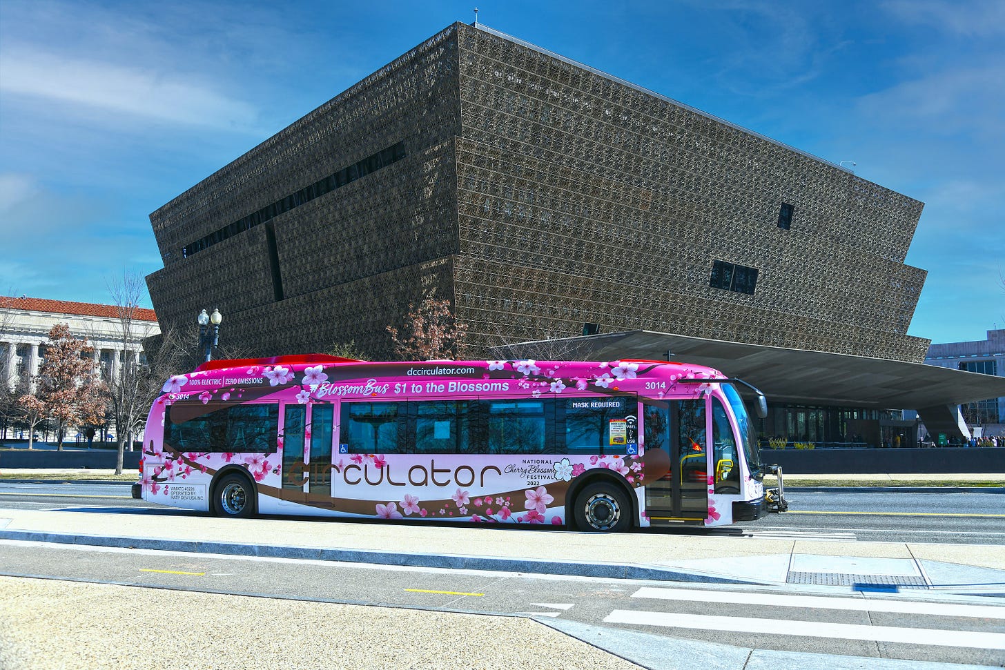 DC Circulator Cherry Blossom bus in front of the National Museum of African American History and Culture DC Circulator Cherry Blossom bus in front of the National Museum of African American History and Culture
