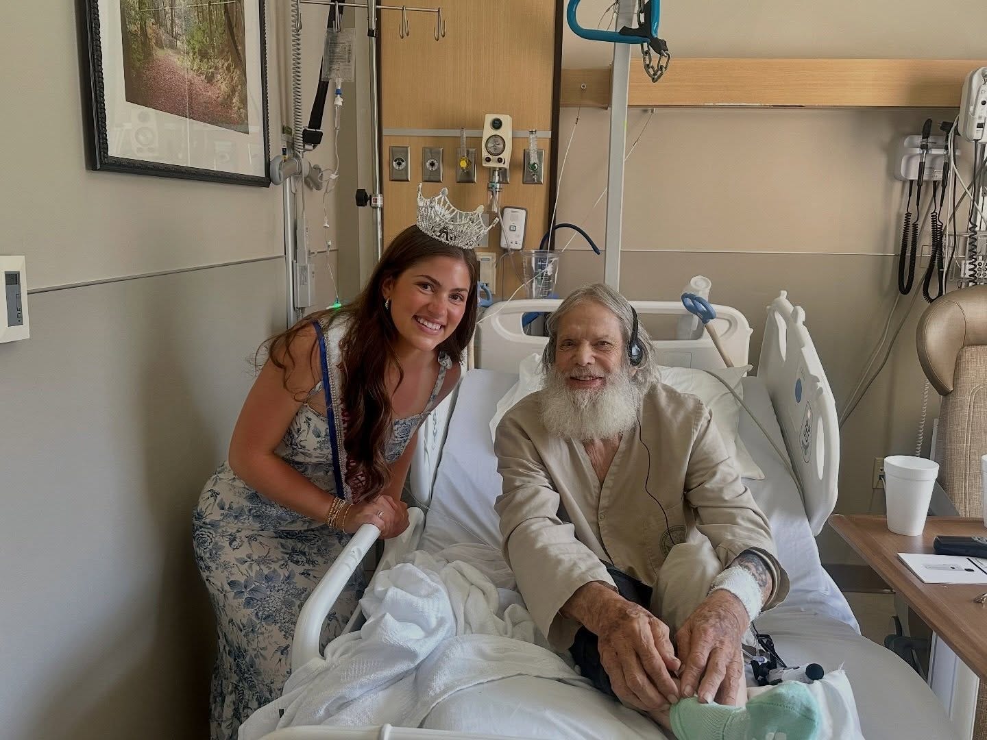 May be an image of smiling and hospital