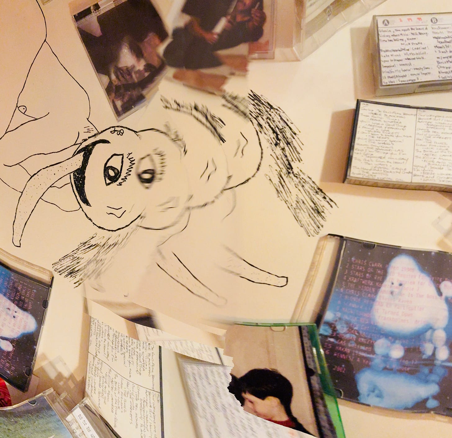 Pictured: an assortment of queer mix tapes/discs in Kirby's collection.