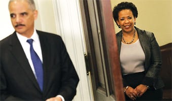 Eric Holder and Loretta Lynch. Photo: The Hill Eric Holder and Loretta Lynch. Photo: The Hill