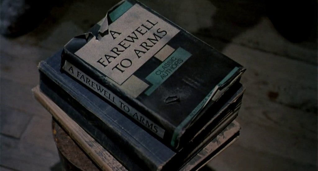 Not sure if it is an Easter Egg or not but, after Ash chops off his evil  hand in Evil Dead 2 (1987), he puts a bucket and and some books on