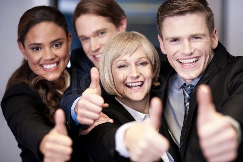 Corporate team gesturing thumbs up | Stock image | Colourbox