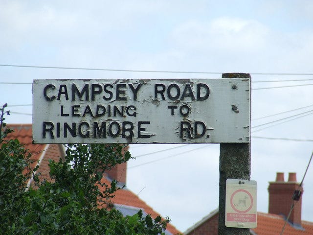 Old Road Sign