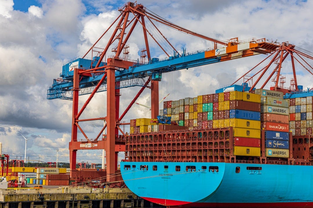blue and red cargo ship blue and red cargo ship