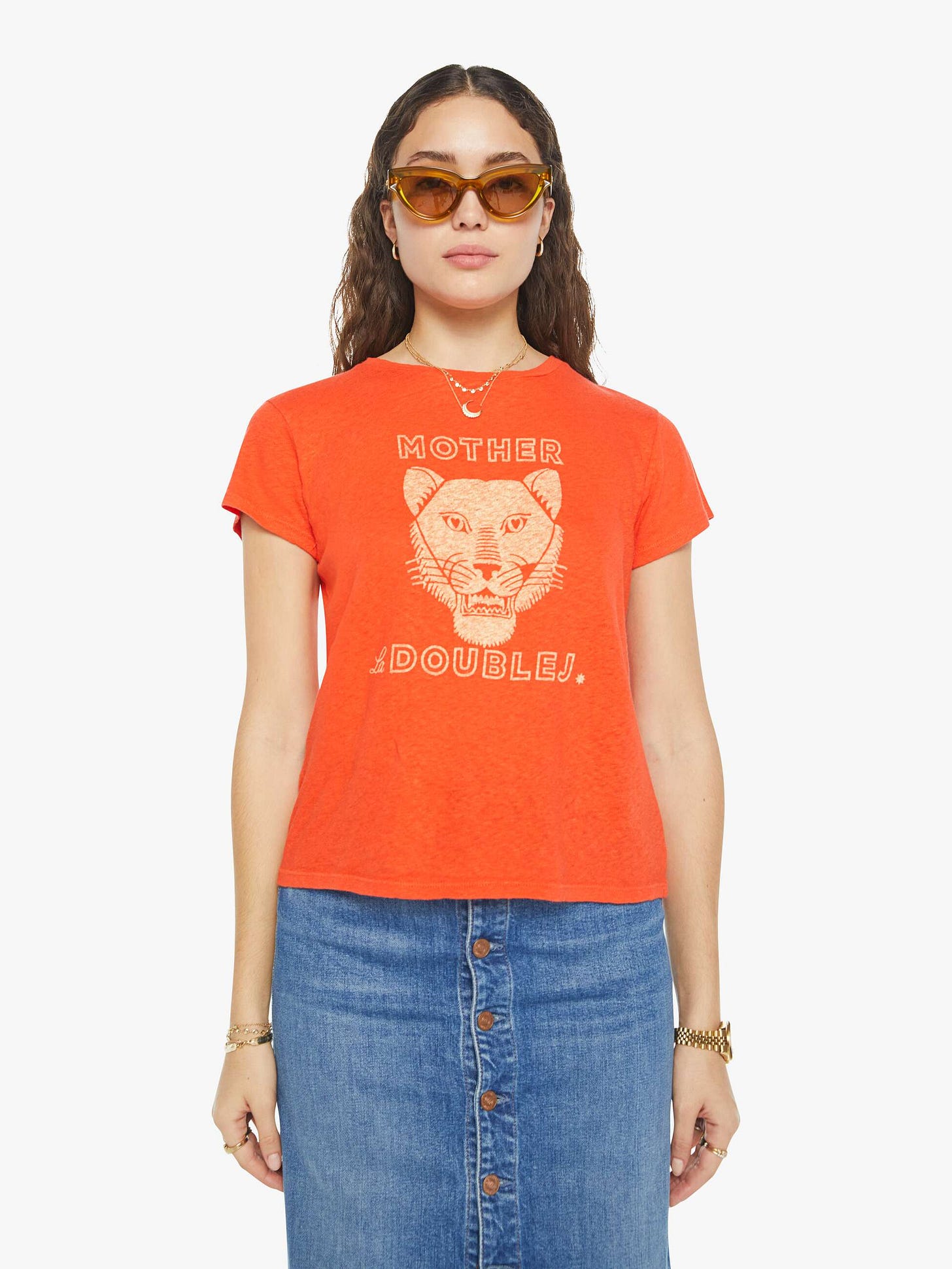 Front view of a woman in a tee with a fierce panther on the front.
