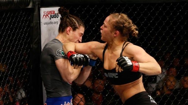 ronda rousey beats sara mcmann best ufc fights ever 2014 images ronda rousey beats sara mcmann best ufc fights ever 2014 images