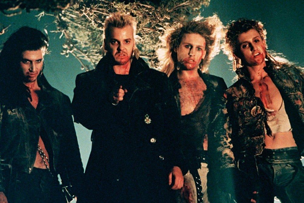 The vampire gang from The Lost Boys, a cult beach horror film blending teen rebellion with supernatural thrills.