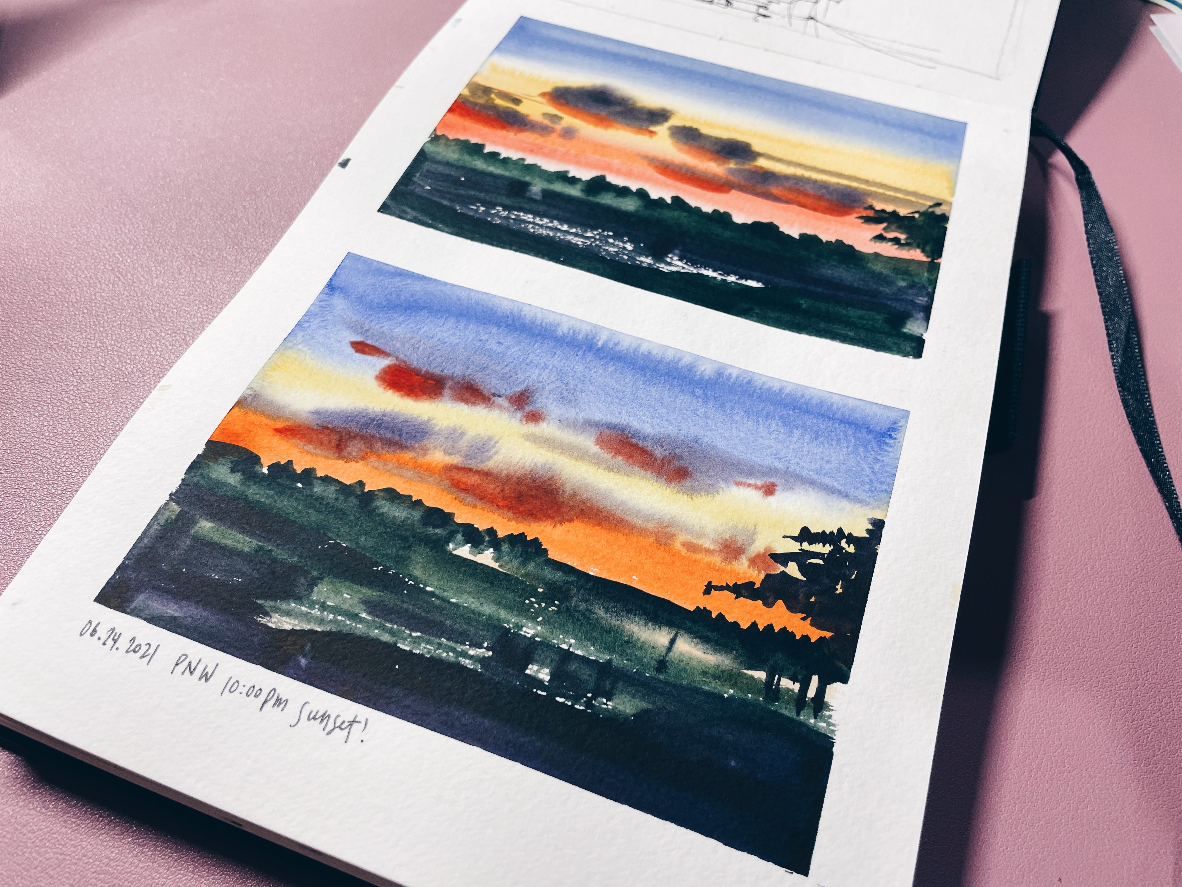 Capturing skies in my journal spreads - by April Wu