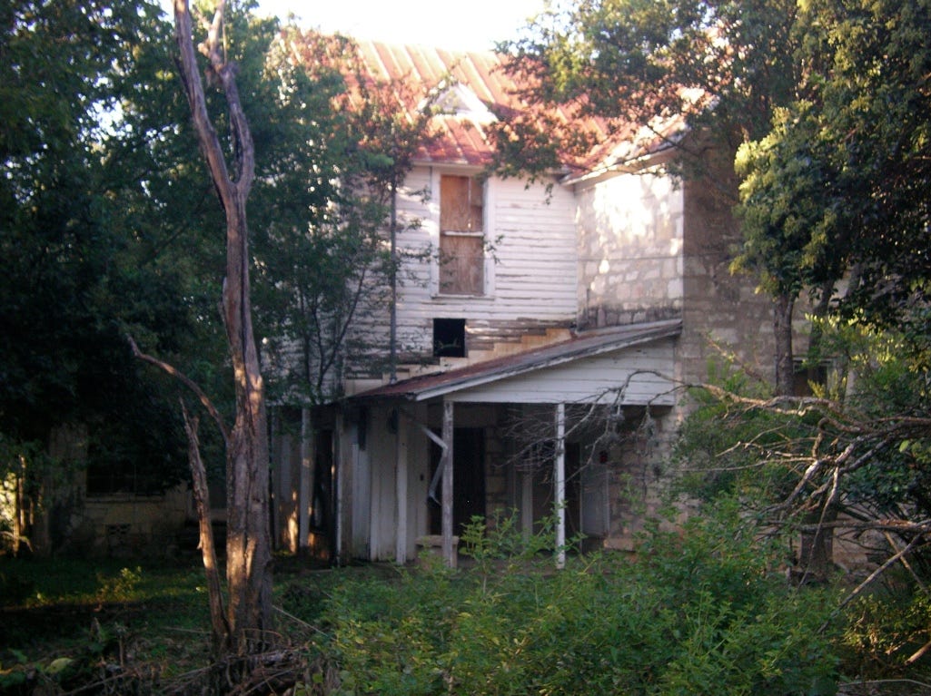 A house with trees around it

AI-generated content may be incorrect.