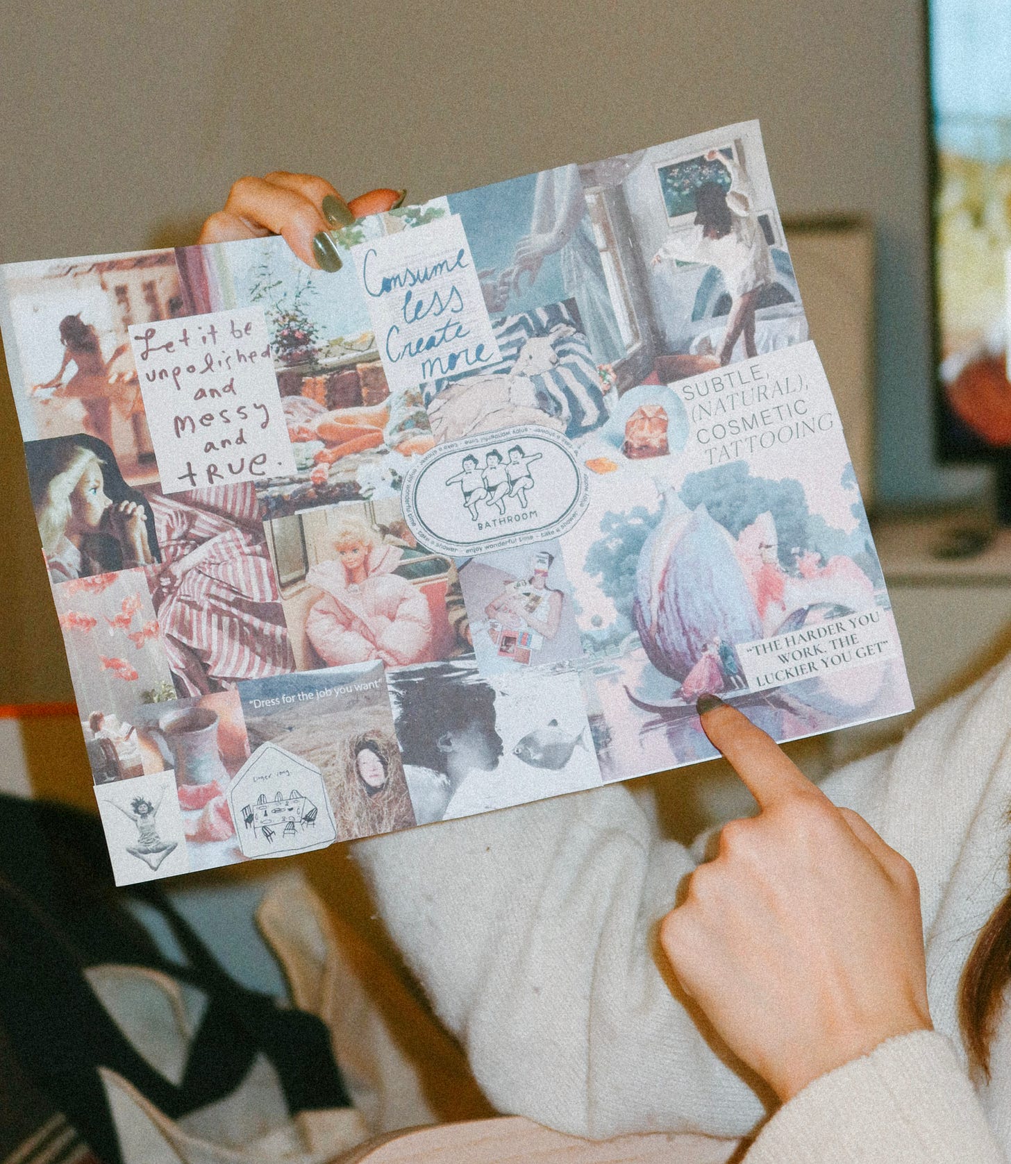 Close-up of a collage page filled with photos, handwritten notes, and pastel imagery
