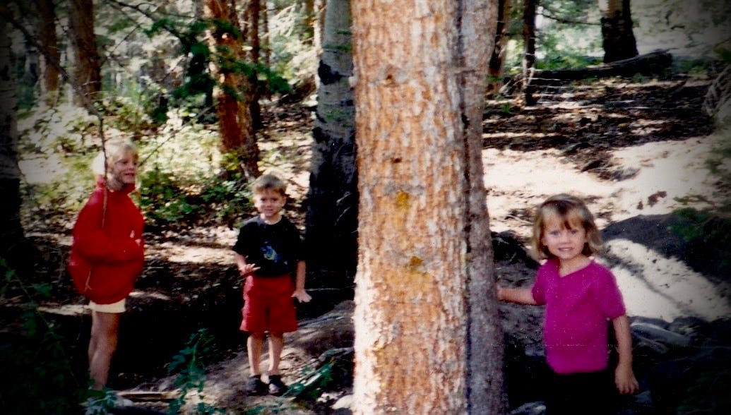 author on the left, brother in the middle, and subject on the right