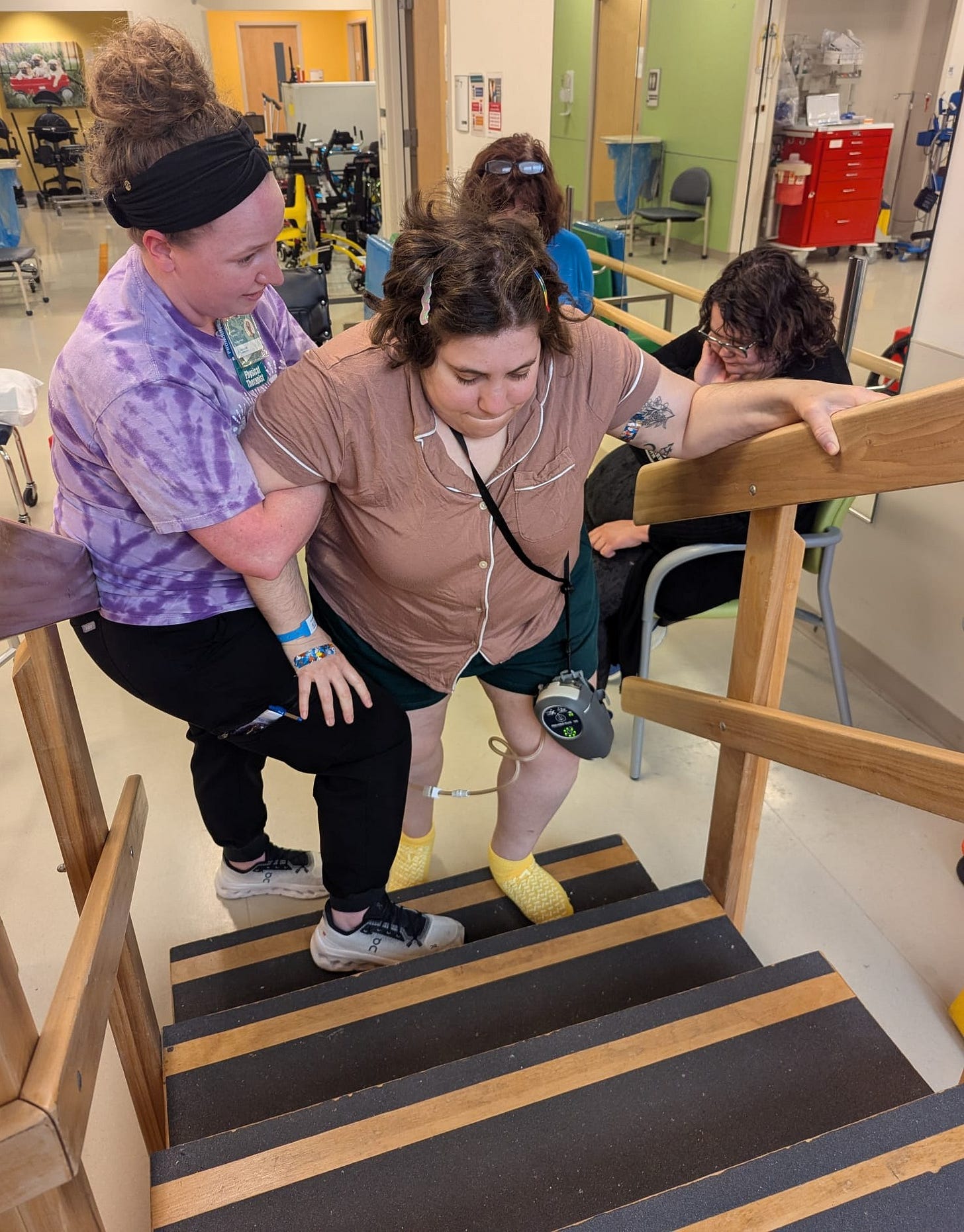 Relearning how to do the stairs at the hospital physical therapy gym.