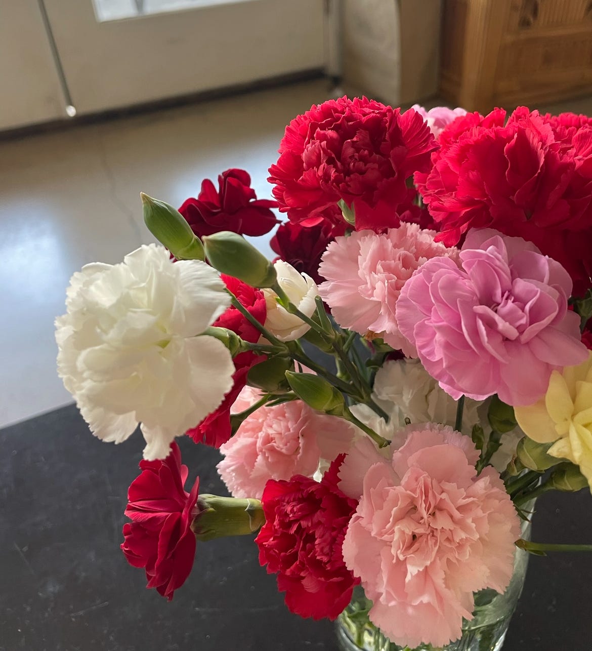 Picture shows a bouquet of carnations close up. Picture shows a bouquet of carnations close up.
