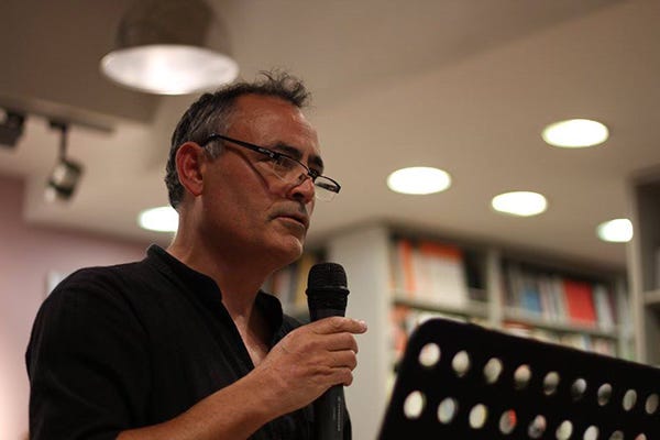 photo of Roy Marshall, with a mic