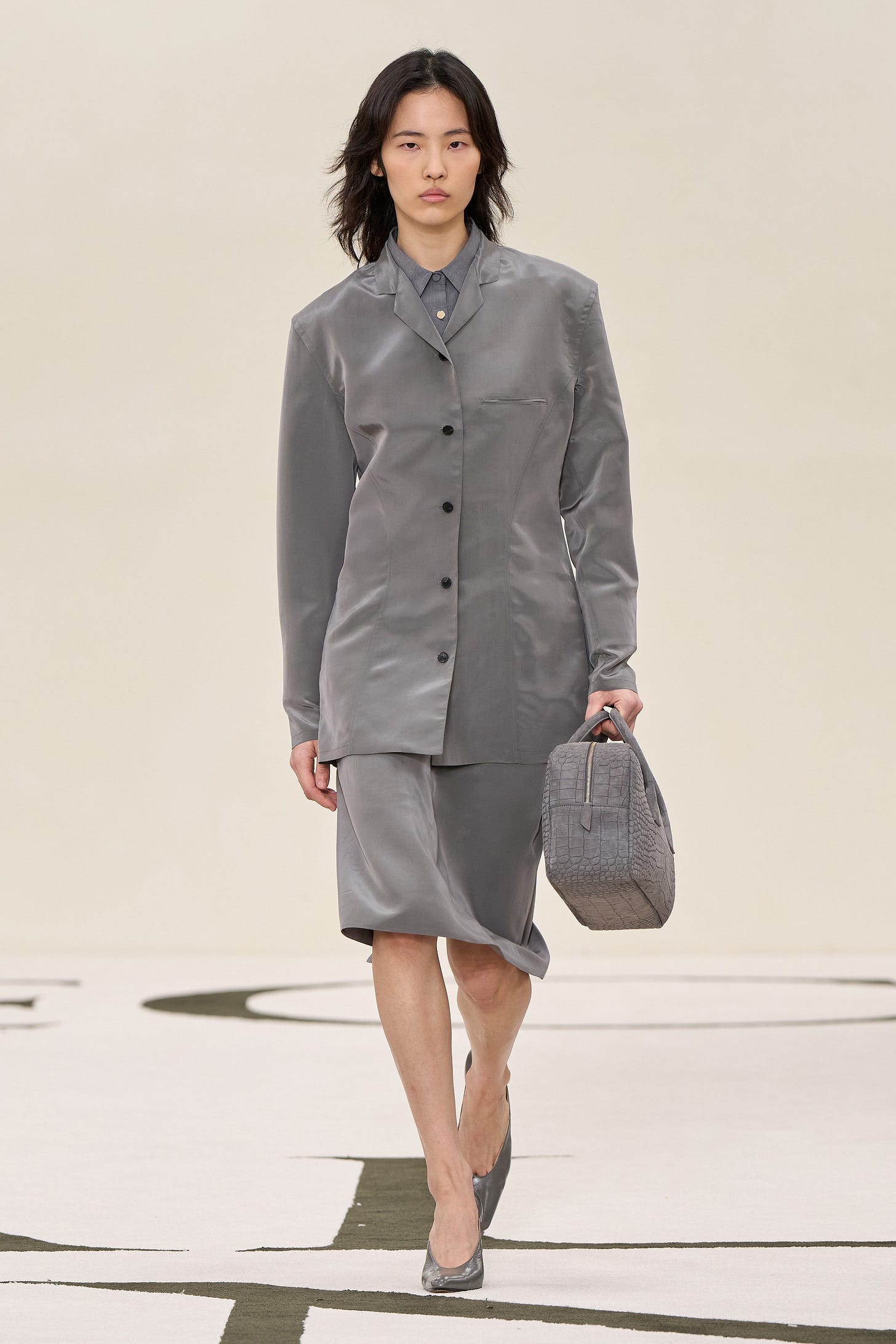 CALVIN KLEIN COLLECTION HAS A ROCKY RELAUNCH - by Martin