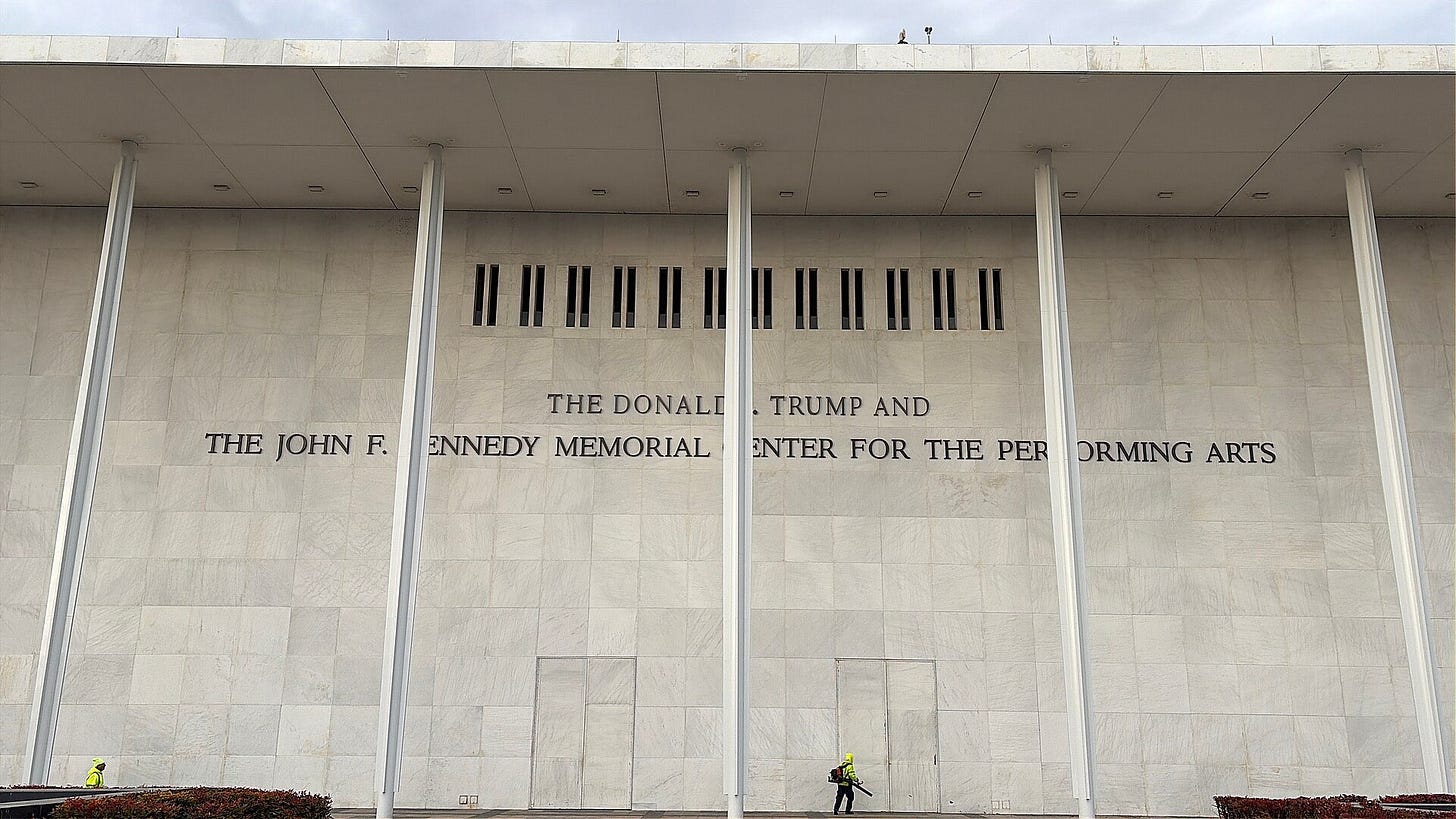 kennedy center facade, with trump's stupid name added. a worker is in front of the building kennedy center facade, with trump's stupid name added. a worker is in front of the building