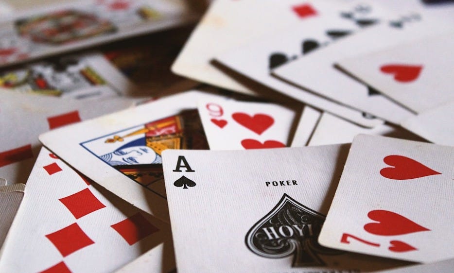 scattered playing cards scattered playing cards